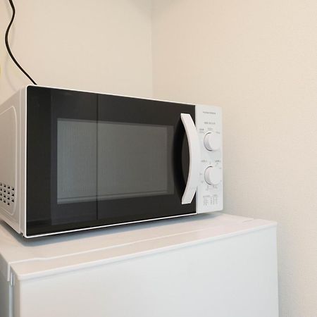 Апартаменты Tasuki Smart Higashishinjuku Токио Экстерьер фото