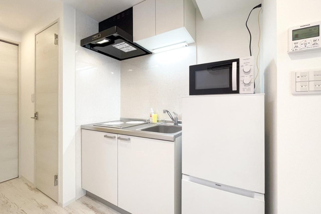 Апартаменты Tasuki Smart Higashishinjuku Токио Экстерьер фото