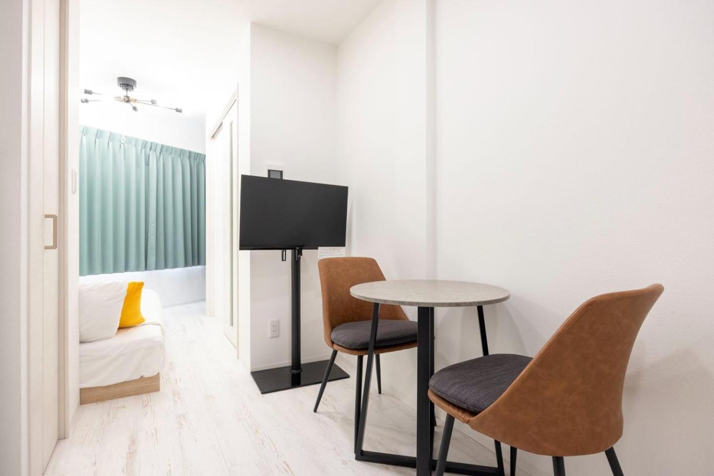 Апартаменты Tasuki Smart Higashishinjuku Токио Экстерьер фото