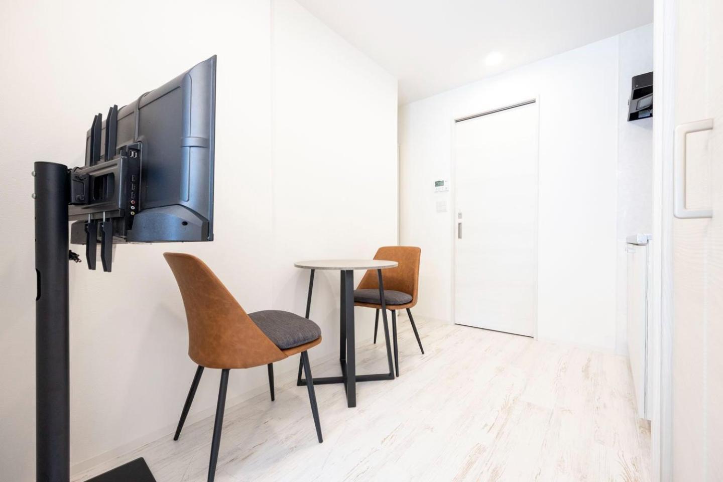 Апартаменты Tasuki Smart Higashishinjuku Токио Экстерьер фото