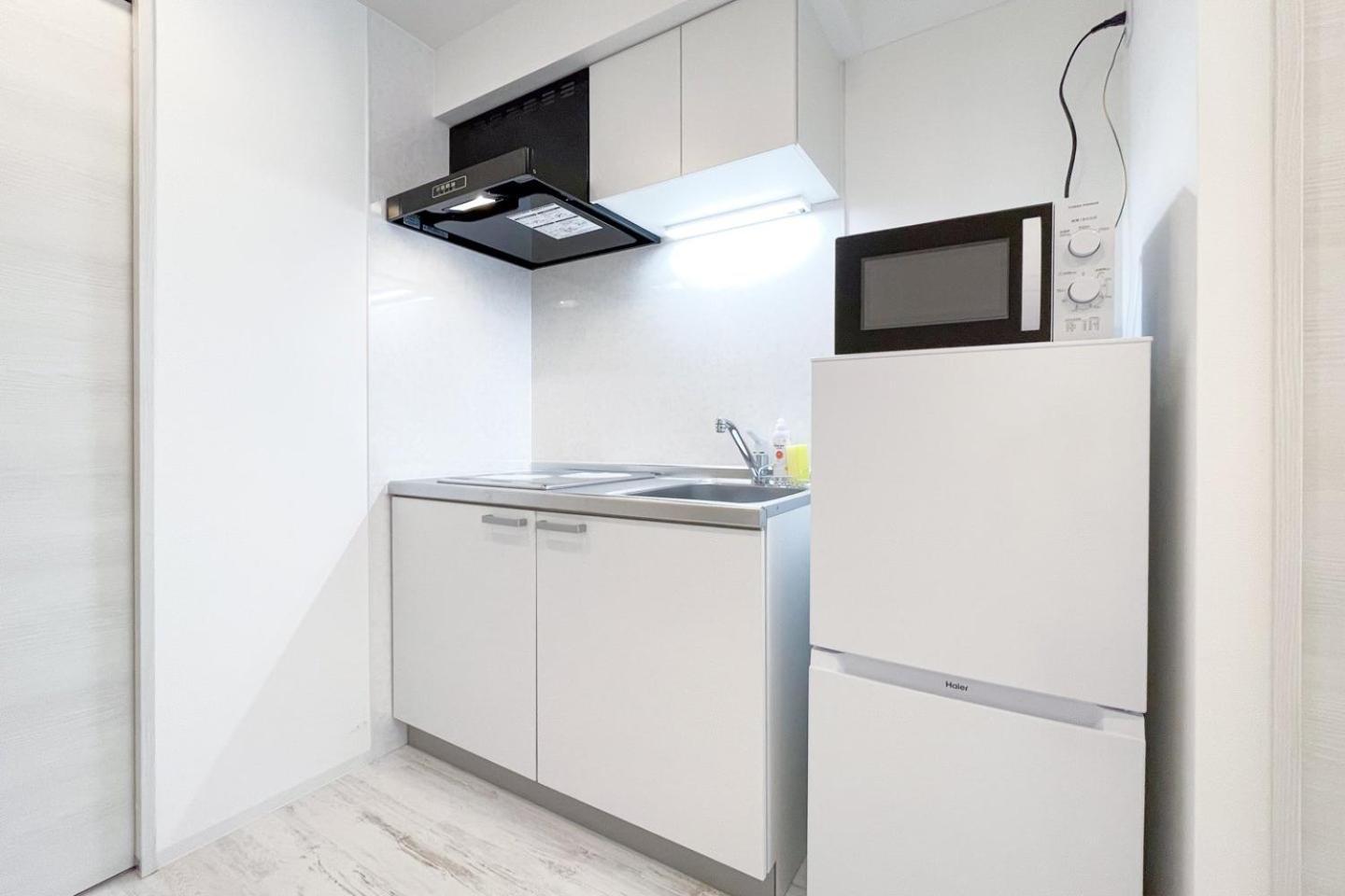 Апартаменты Tasuki Smart Higashishinjuku Токио Экстерьер фото